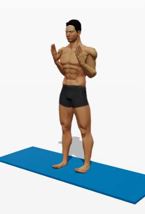 Kiran standing in prayer pose